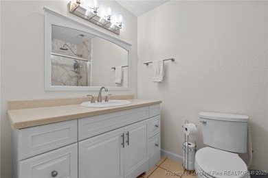 Discover this stunning home on a lakefront lot in the on Woodlake Country Club in North Carolina - for sale on GolfHomes.com, golf home, golf lot