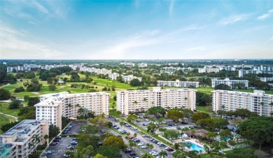 This beautiful 2-bedroom 2-bathroom condo located in the on Palm-Aire Country Club and Resort - Palms in Florida - for sale on GolfHomes.com, golf home, golf lot