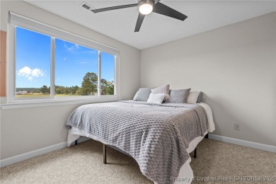 Discover this stunning home on a lakefront lot in the on Woodlake Country Club in North Carolina - for sale on GolfHomes.com, golf home, golf lot