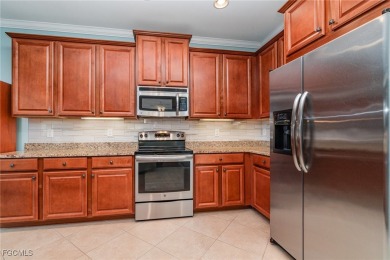 Beautifully updated home sits on the 13th fairway, non flood on Herons Glen Golf and Country Club in Florida - for sale on GolfHomes.com, golf home, golf lot
