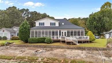 Discover this stunning home on a lakefront lot in the on Woodlake Country Club in North Carolina - for sale on GolfHomes.com, golf home, golf lot