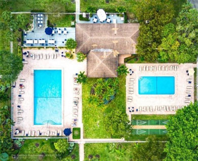 This beautiful 2-bedroom 2-bathroom condo located in the on Palm-Aire Country Club and Resort - Palms in Florida - for sale on GolfHomes.com, golf home, golf lot