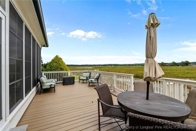 Discover this stunning home on a lakefront lot in the on Woodlake Country Club in North Carolina - for sale on GolfHomes.com, golf home, golf lot
