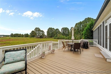 Discover this stunning home on a lakefront lot in the on Woodlake Country Club in North Carolina - for sale on GolfHomes.com, golf home, golf lot