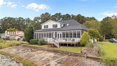 Discover this stunning home on a lakefront lot in the on Woodlake Country Club in North Carolina - for sale on GolfHomes.com, golf home, golf lot