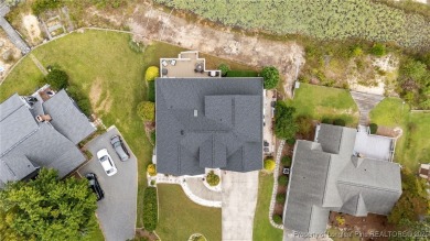 Discover this stunning home on a lakefront lot in the on Woodlake Country Club in North Carolina - for sale on GolfHomes.com, golf home, golf lot