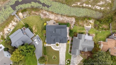 Discover this stunning home on a lakefront lot in the on Woodlake Country Club in North Carolina - for sale on GolfHomes.com, golf home, golf lot
