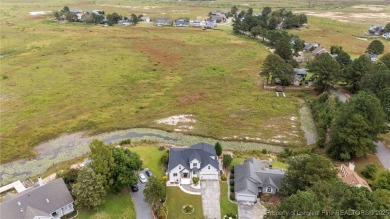 Discover this stunning home on a lakefront lot in the on Woodlake Country Club in North Carolina - for sale on GolfHomes.com, golf home, golf lot