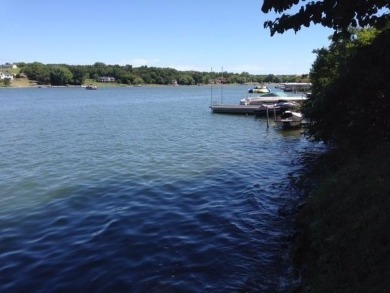 Beautiful 1.9-acre wooded waterfront lot on the main body of on Lake Carroll Golf Course in Illinois - for sale on GolfHomes.com, golf home, golf lot