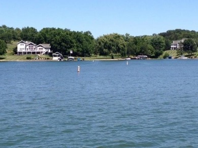 Beautiful 1.9-acre wooded waterfront lot on the main body of on Lake Carroll Golf Course in Illinois - for sale on GolfHomes.com, golf home, golf lot