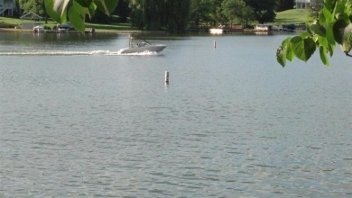 Beautiful 1.9-acre wooded waterfront lot on the main body of on Lake Carroll Golf Course in Illinois - for sale on GolfHomes.com, golf home, golf lot