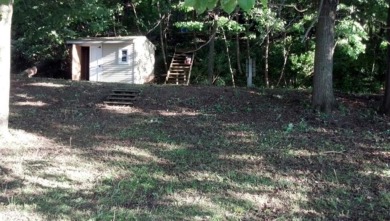 Beautiful 1.9-acre wooded waterfront lot on the main body of on Lake Carroll Golf Course in Illinois - for sale on GolfHomes.com, golf home, golf lot