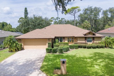 Come take a look at this beautiful 3 bedroom 2.5 bathroom solid on Spruce Creek Golf Club in Florida - for sale on GolfHomes.com, golf home, golf lot