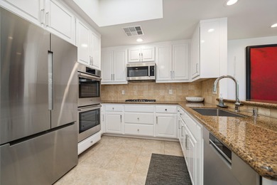 Step inside this desert dream showcasing new, extensive upgrades on The Springs Country Club in California - for sale on GolfHomes.com, golf home, golf lot