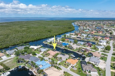 SAIL ACCESS POOL HOME IN PGI W/110FT SEAWALL, 3-CAR GARAGE on Saint Andrews South Golf Club in Florida - for sale on GolfHomes.com, golf home, golf lot