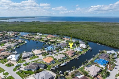 SAIL ACCESS POOL HOME IN PGI W/110FT SEAWALL, 3-CAR GARAGE on Saint Andrews South Golf Club in Florida - for sale on GolfHomes.com, golf home, golf lot