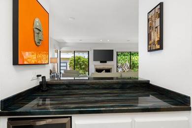 Step inside this desert dream showcasing new, extensive upgrades on The Springs Country Club in California - for sale on GolfHomes.com, golf home, golf lot