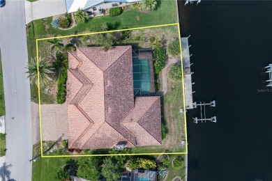 SAIL ACCESS POOL HOME IN PGI W/110FT SEAWALL, 3-CAR GARAGE on Saint Andrews South Golf Club in Florida - for sale on GolfHomes.com, golf home, golf lot