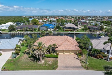 SAIL ACCESS POOL HOME IN PGI W/110FT SEAWALL, 3-CAR GARAGE on Saint Andrews South Golf Club in Florida - for sale on GolfHomes.com, golf home, golf lot