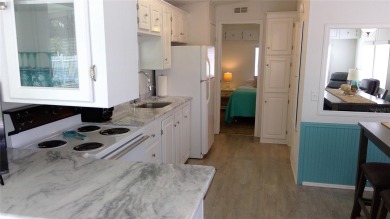 This adorable park model is conveniently located at the front of on Lily Lake Golf and RV Resort in Florida - for sale on GolfHomes.com, golf home, golf lot