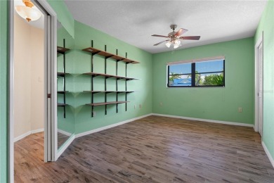 SAIL ACCESS POOL HOME IN PGI W/110FT SEAWALL, 3-CAR GARAGE on Saint Andrews South Golf Club in Florida - for sale on GolfHomes.com, golf home, golf lot
