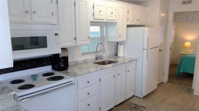 This adorable park model is conveniently located at the front of on Lily Lake Golf and RV Resort in Florida - for sale on GolfHomes.com, golf home, golf lot