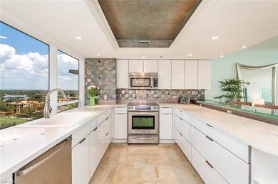 Imagine living amidst the colors of the sea in this on Club at Pelican Bay Golf Course in Florida - for sale on GolfHomes.com, golf home, golf lot