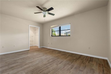SAIL ACCESS POOL HOME IN PGI W/110FT SEAWALL, 3-CAR GARAGE on Saint Andrews South Golf Club in Florida - for sale on GolfHomes.com, golf home, golf lot