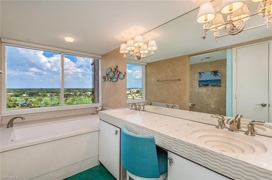 Imagine living amidst the colors of the sea in this on Club at Pelican Bay Golf Course in Florida - for sale on GolfHomes.com, golf home, golf lot