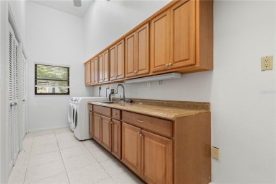 SAIL ACCESS POOL HOME IN PGI W/110FT SEAWALL, 3-CAR GARAGE on Saint Andrews South Golf Club in Florida - for sale on GolfHomes.com, golf home, golf lot