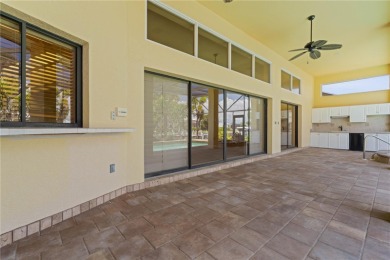 SAIL ACCESS POOL HOME IN PGI W/110FT SEAWALL, 3-CAR GARAGE & on Saint Andrews South Golf Club in Florida - for sale on GolfHomes.com, golf home, golf lot