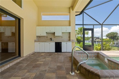 SAIL ACCESS POOL HOME IN PGI W/110FT SEAWALL, 3-CAR GARAGE & on Saint Andrews South Golf Club in Florida - for sale on GolfHomes.com, golf home, golf lot