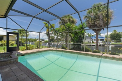 SAIL ACCESS POOL HOME IN PGI W/110FT SEAWALL, 3-CAR GARAGE & on Saint Andrews South Golf Club in Florida - for sale on GolfHomes.com, golf home, golf lot