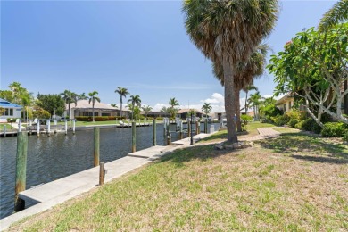 SAIL ACCESS POOL HOME IN PGI W/110FT SEAWALL, 3-CAR GARAGE & on Saint Andrews South Golf Club in Florida - for sale on GolfHomes.com, golf home, golf lot