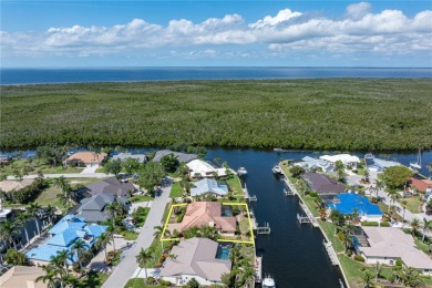 SAIL ACCESS POOL HOME IN PGI W/110FT SEAWALL, 3-CAR GARAGE & on Saint Andrews South Golf Club in Florida - for sale on GolfHomes.com, golf home, golf lot