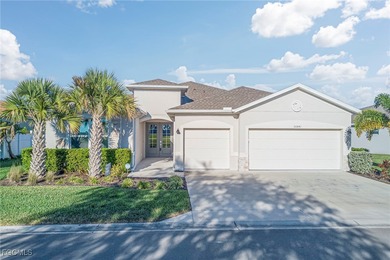 Elegant and expansive, this refined residence offers 3 bedrooms on Copperhead Golf Club in Florida - for sale on GolfHomes.com, golf home, golf lot