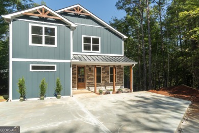Discover refined mountain living in the prestigious Innsbruck on Innsbruck Resort and Golf Club in Georgia - for sale on GolfHomes.com, golf home, golf lot