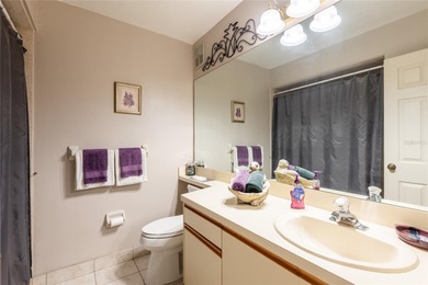 Located in the desirable East Lake area, this updated 2-bedroom on Tarpon Woods Golf Club in Florida - for sale on GolfHomes.com, golf home, golf lot