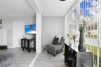 Beautifully remodeled 2-bedroom, 2-bath unit on the 1st floor on Sunrise Lakes Phase IV Golf Course in Florida - for sale on GolfHomes.com, golf home, golf lot