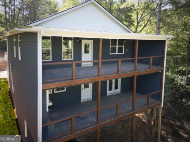 Discover refined mountain living in the prestigious Innsbruck on Innsbruck Resort and Golf Club in Georgia - for sale on GolfHomes.com, golf home, golf lot