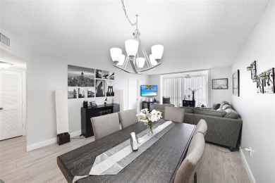 Beautifully remodeled 2-bedroom, 2-bath unit on the 1st floor on Sunrise Lakes Phase IV Golf Course in Florida - for sale on GolfHomes.com, golf home, golf lot