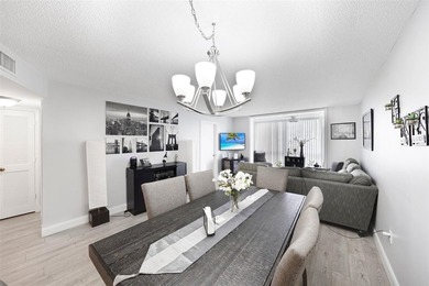 Beautifully remodeled 2-bedroom, 2-bath unit on the 1st floor on Sunrise Lakes Phase IV Golf Course in Florida - for sale on GolfHomes.com, golf home, golf lot