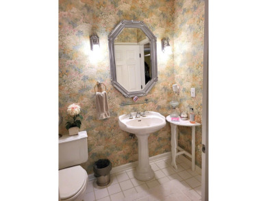 Exceptionally maintained brick home in the Wyboo Plantation on Players Course At Wyboo Plantation in South Carolina - for sale on GolfHomes.com, golf home, golf lot