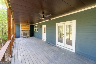 Discover refined mountain living in the prestigious Innsbruck on Innsbruck Resort and Golf Club in Georgia - for sale on GolfHomes.com, golf home, golf lot