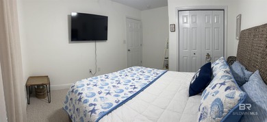 Coastal charm meets comfort in this move-in ready 3-bedroom on Orange Beach Golf Center in Alabama - for sale on GolfHomes.com, golf home, golf lot