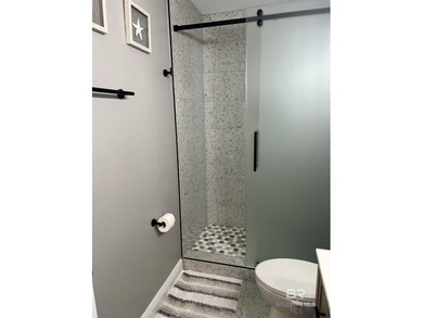 Coastal charm meets comfort in this move-in ready 3-bedroom on Orange Beach Golf Center in Alabama - for sale on GolfHomes.com, golf home, golf lot