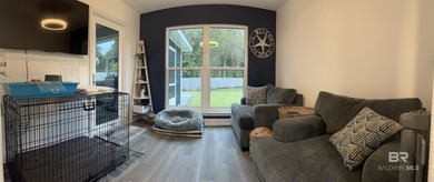 Coastal charm meets comfort in this move-in ready 3-bedroom on Orange Beach Golf Center in Alabama - for sale on GolfHomes.com, golf home, golf lot