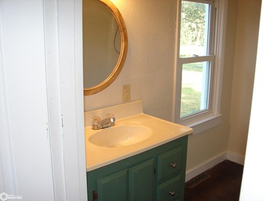 This 1.5-story, 3-bedroom, 1-bath home is a perfect opportunity on Twin Lakes Golf Course in Iowa - for sale on GolfHomes.com, golf home, golf lot