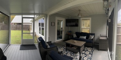 Coastal charm meets comfort in this move-in ready 3-bedroom on Orange Beach Golf Center in Alabama - for sale on GolfHomes.com, golf home, golf lot