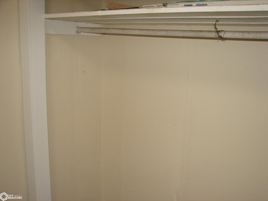 This 1.5-story, 3-bedroom, 1-bath home is a perfect opportunity on Twin Lakes Golf Course in Iowa - for sale on GolfHomes.com, golf home, golf lot